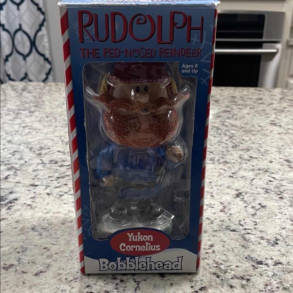 Yukon Cornelius Bobblehead - Red and Blue